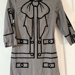 Eye catching top-stitched cotton dress from Spain.